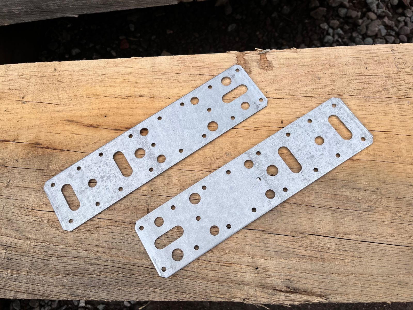 Steel flat connector plates used to join railway sleepers together