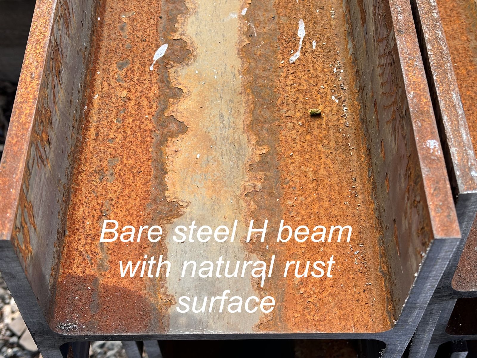 Bare steel H beam to use with railway sleepers that will naturally develop a rusty red surface. Railwaysleepers.com