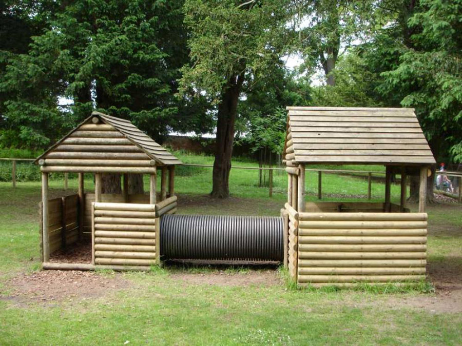 Interlinking play houses at Belton house with wooden landscaping poles. Railwaysleepers.com