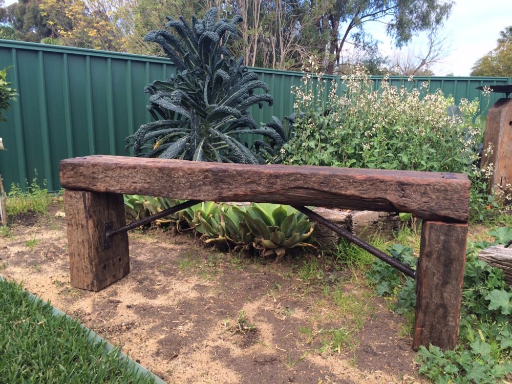 Garden bench made from rustic weathered reclaimed Jarrah railway sleeper. Railwaysleepers.com