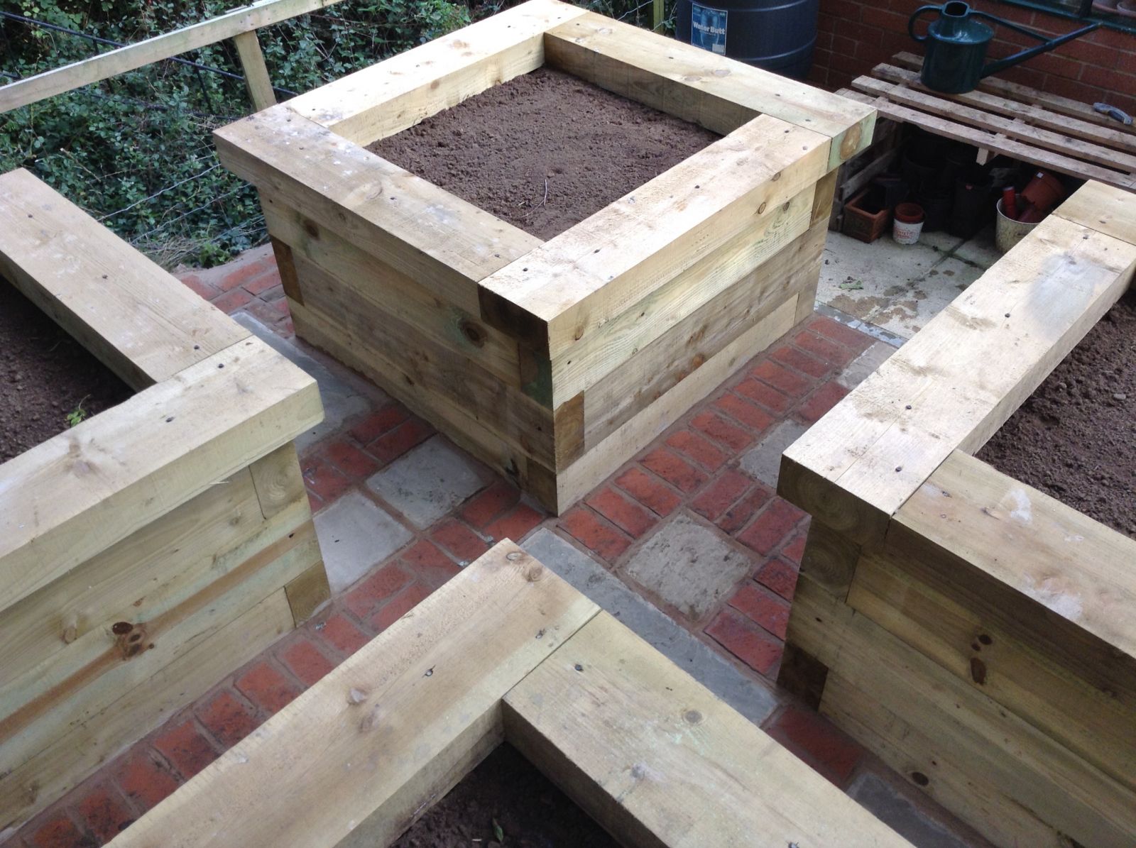 Collection of raised beds made from new pine railway sleepers. Railwaysleepers.com