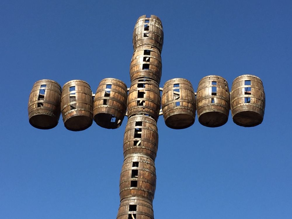 Huge cross in Chile made from used oak barrels. Railwaysleepers.com