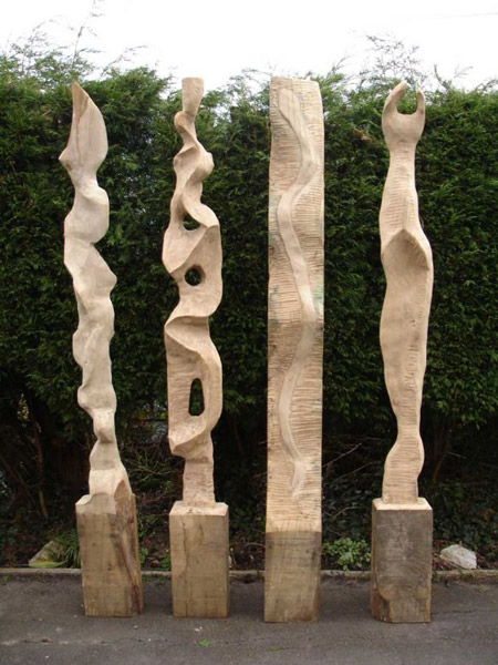 John Brian's sculptures created from new oak railway sleepers. Railwaysleepers.com