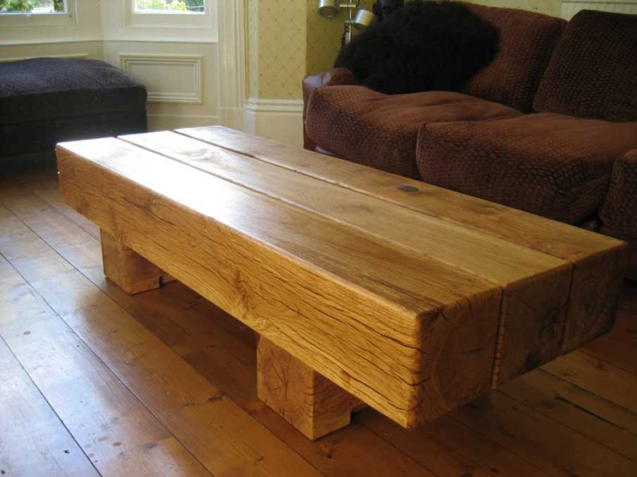Low level coffee table made from new oak railway sleepers. Railwaysleepers.com