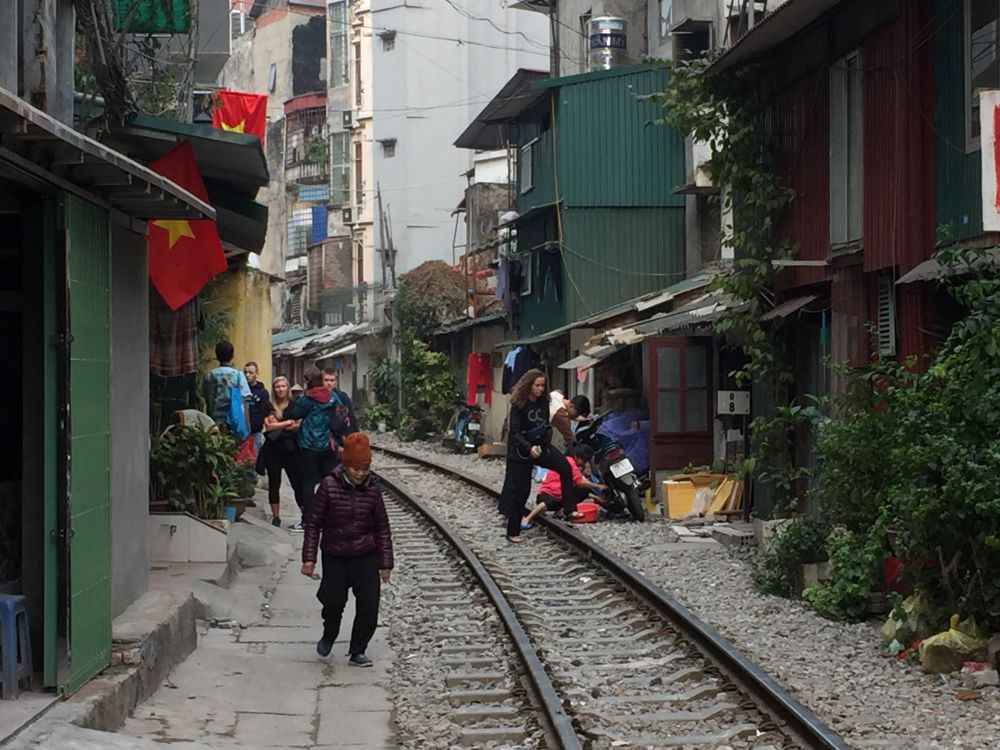 Railway sleeper tracks run so close to the houses in Hanoi. Railwaysleepers.com