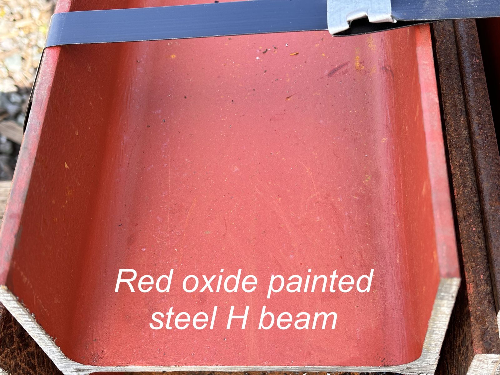 Red oxide painted H beam to use with railway sleepers that acts as an undercoat but will naturally develop a rusty red surface if left unpainted. Railwaysleepers.com