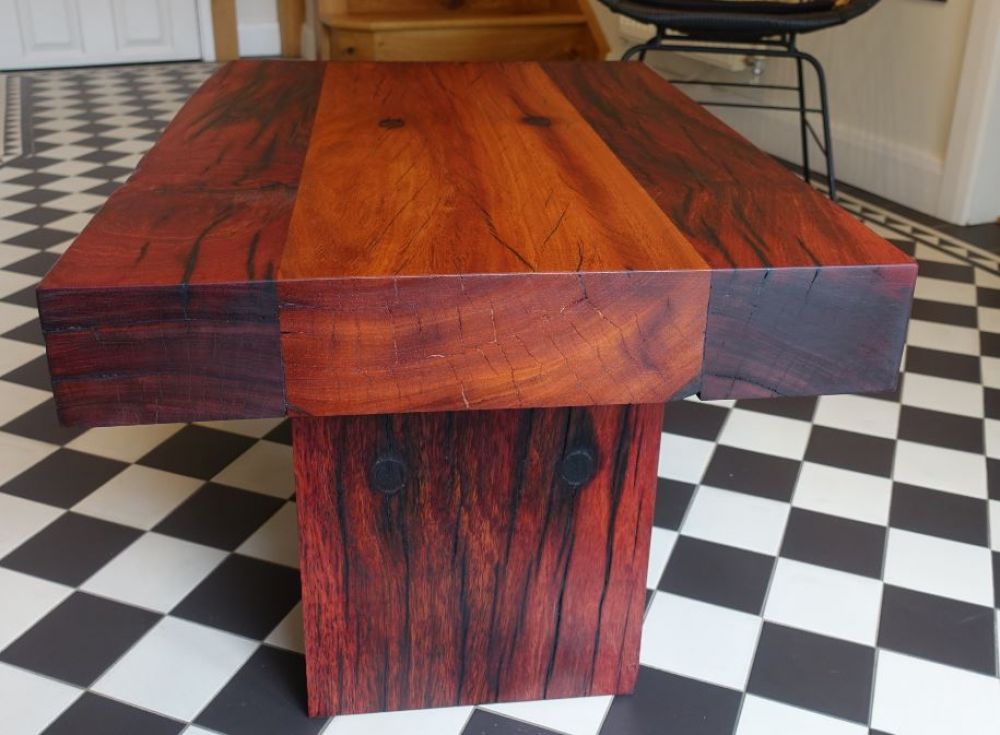 Beautiful table made from used tropical hardwood railway sleepers. Railwaysleepers.com