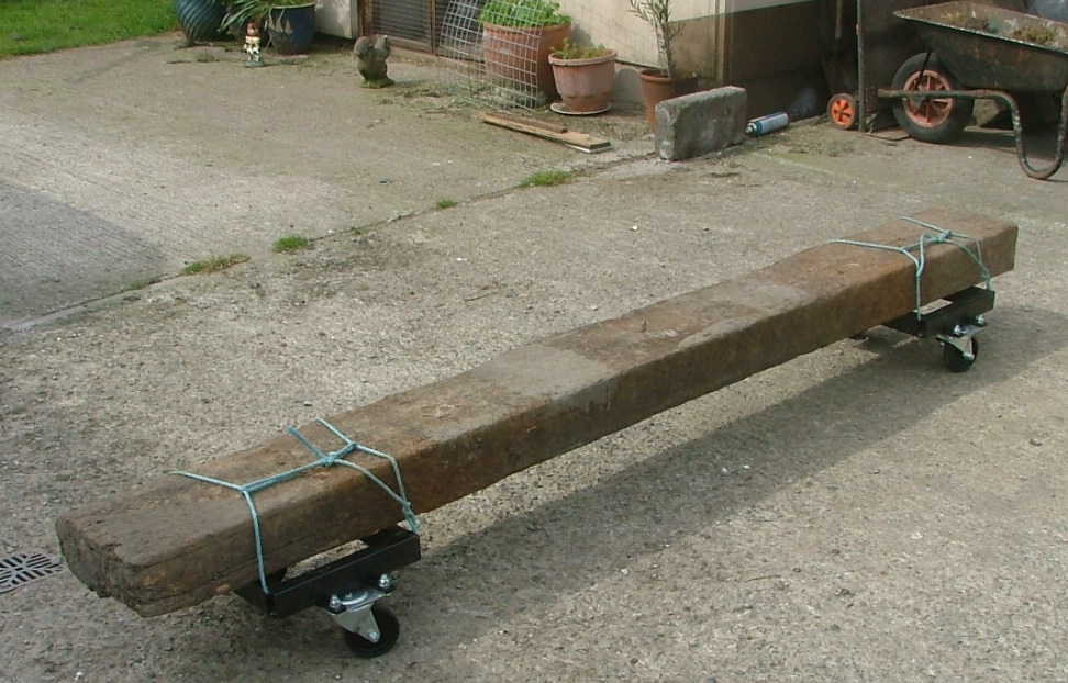 Attaching wheels to the underneath of a heavy railway sleeper makes transporting much easier. Railwaysleepers.com