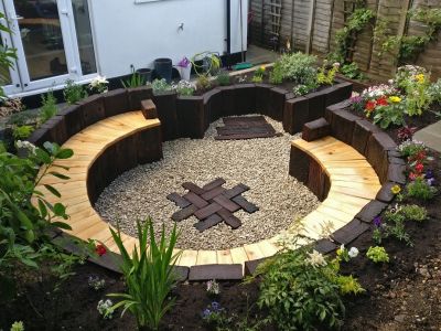 JAMES'S INSPIRING CURVED SEATING AREA with old tropical hardwood railway sleepers