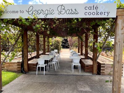 THE ENTRANCE TO THE GEORGIE BASS CAFE IN FLINDERS MADE WITH EYE-CATCHING NEW RAILWAY SLEEPER RAISED BEDS