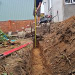 BUILDING A GARDEN RETAINING WALL WITH OLD OAK RAILWAY SLEEPERS