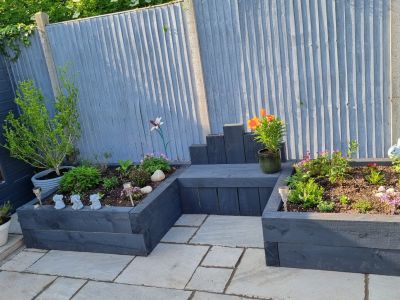 DAVE KENNEDY'S STYLISH RAISED PLANTERS WITH GREY STAINED RAILWAY SLEEPERS