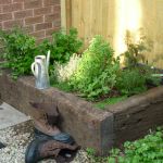 THE SIMPLEST OF HERB BEDS WITH TROPICAL HARDWOOD RAILWAY SLEEPERS
