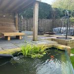 ADRIAN'S BEAUTIFUL PATIO, POND AND TABLE WITH NEW PINE RAILWAY SLEEPERS.
