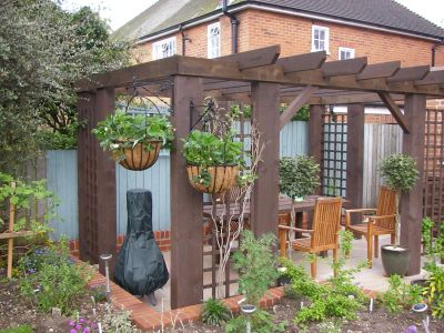 PENNY & ANDY'S WONDERFUL PERGOLA WITH UPRIGHT NEW PINE RAILWAY SLEEPERS