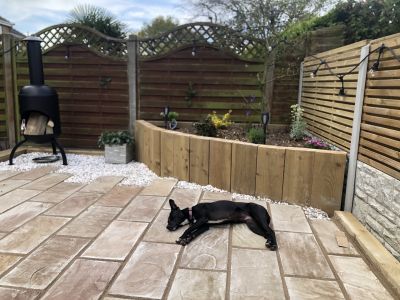 DAVID TRANSFORMS AN OVERGROWN END OF GARDEN INTO IMPRESSIVE PATIO WITH NEW PINE RAILWAY SLEEPERS