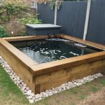STEVE BUILDS A RAISED FISH POND WITH NEW PINE RAILWAY SLEEPERS