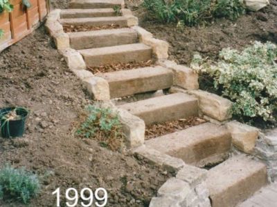 IMPRESSIVE STEPS! PAUL FIRST BOUGHT HIS RAILWAY SLEEPER FROM US IN 1999 AND IS ONLY NOW REPLACING THEM!