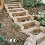 IMPRESSIVE STEPS! PAUL FIRST BOUGHT HIS RAILWAY SLEEPER FROM US IN 1999 AND IS ONLY NOW REPLACING THEM!