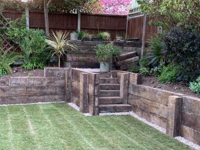 A MAGICAL TRANSFORMATION WITH OLD OAK RAILWAY SLEEPERS