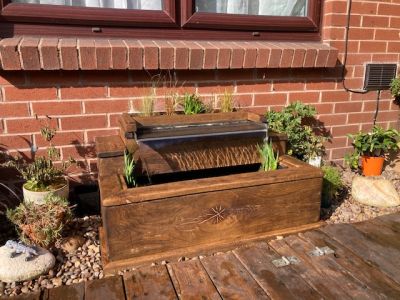JOACHIM BUILDS A BEAUTIFUL WATER FEATURE FROM NEW OAK RAILWAY SLEEPERS