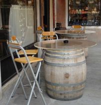 Oak barrel used as bar and restaurant table. Railwaysleepers.com