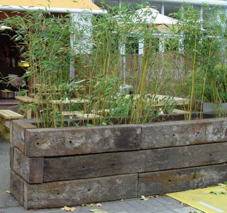 Raised garden beds built from used tropical hardwood railway sleepers. Railwaysleepers.com 