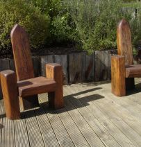 Throne like chairs created from new oak railway sleepers. Railwaysleepers.com