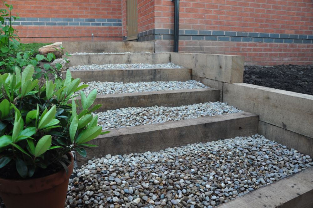 Simon's raised bed & stairs from new oak railway sleepers